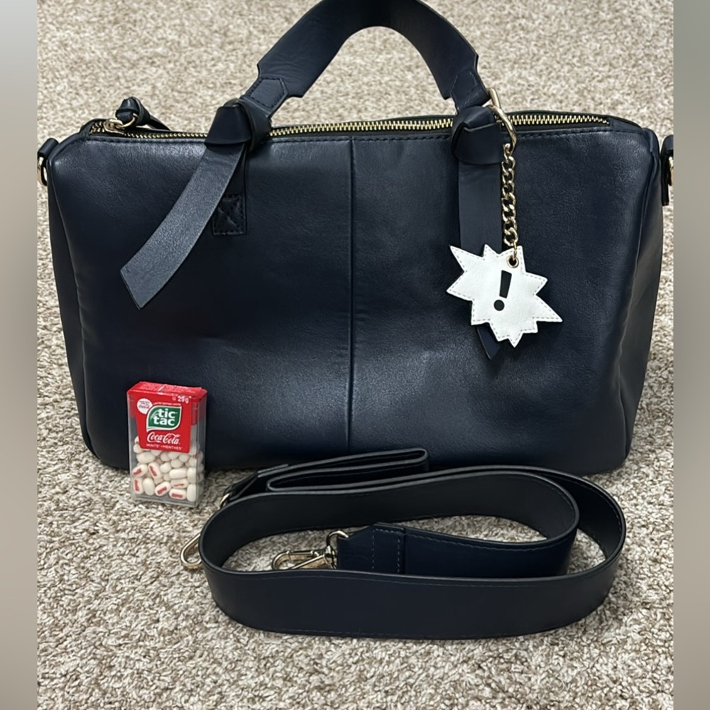 Navy handbag with crossbody strap